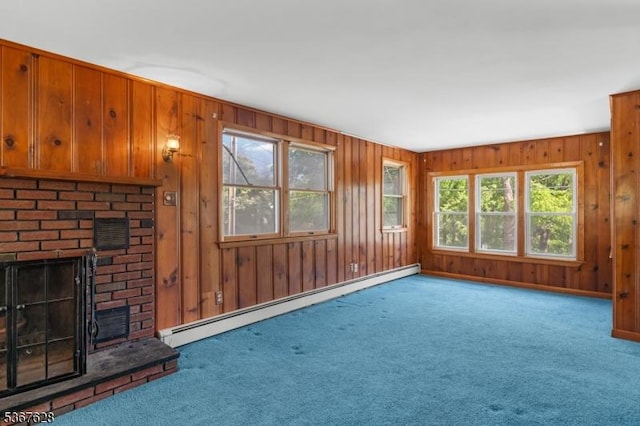 150 Buckley Ave, Oxford Twp, NJ 07863 - unfurnished living room featuring a baseboard radiator, carpet, a brick fireplace, and wooden walls