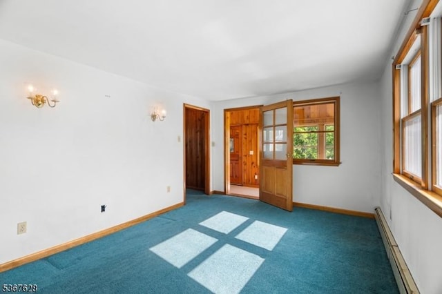 150 Buckley Ave, Oxford Twp, NJ 07863 - carpeted spare room featuring a baseboard heating unit and baseboards
