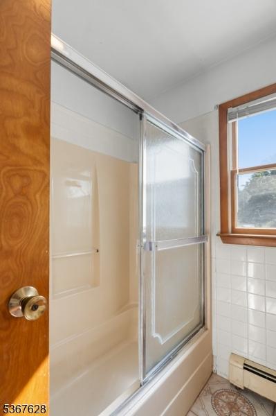 150 Buckley Ave, Oxford Twp, NJ 07863 - full bathroom featuring a baseboard radiator and tile patterned floors