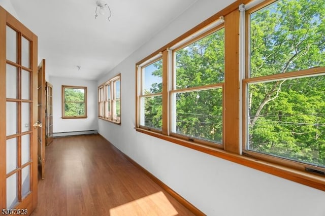 150 Buckley Ave, Oxford Twp, NJ 07863 - unfurnished sunroom featuring a baseboard heating unit
