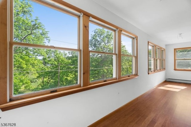 150 Buckley Ave, Oxford Twp, NJ 07863 - unfurnished sunroom featuring a baseboard heating unit