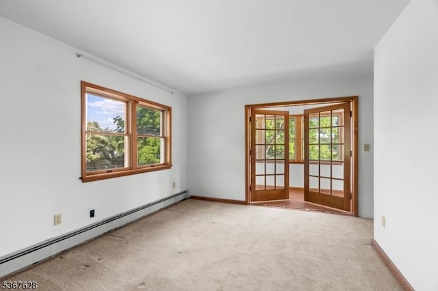 150 Buckley Ave, Oxford Twp, NJ 07863 - spare room with a baseboard heating unit, plenty of natural light, and carpet