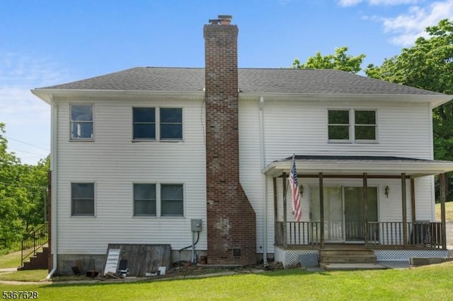 150 Buckley Ave, Oxford Twp, NJ 07863 - back of house featuring covered porch, a chimney, a lawn, and a shingled roof