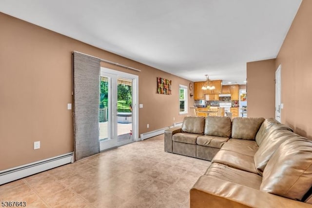 2 Angus Ln, Blairstown Twp, NJ 07825 - living area featuring a chandelier and a baseboard heating unit