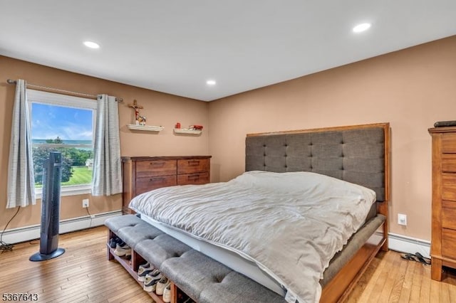 2 Angus Ln, Blairstown Twp, NJ 07825 - bedroom with light wood-style floors, recessed lighting, and a baseboard heating unit