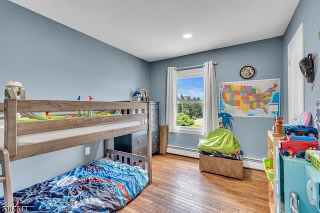 2 Angus Ln, Blairstown Twp, NJ 07825 - bedroom featuring a baseboard radiator, wood-type flooring, and recessed lighting