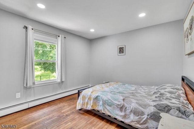 2 Angus Ln, Blairstown Twp, NJ 07825 - bedroom with a baseboard radiator, hardwood / wood-style flooring, and recessed lighting