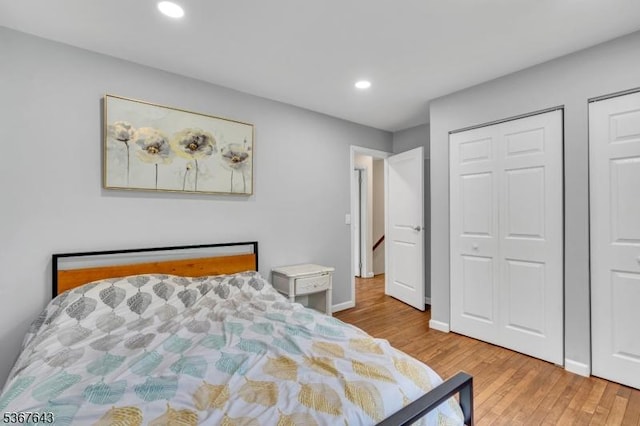 2 Angus Ln, Blairstown Twp, NJ 07825 - bedroom with wood finished floors, recessed lighting, and two closets