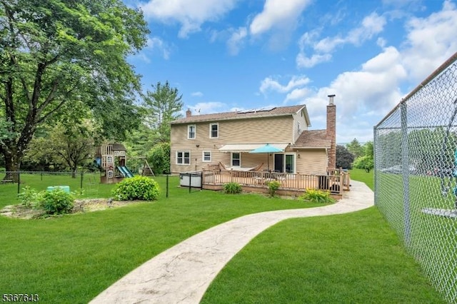 2 Angus Ln, Blairstown Twp, NJ 07825 - back of property featuring a chimney, a deck, and a playground