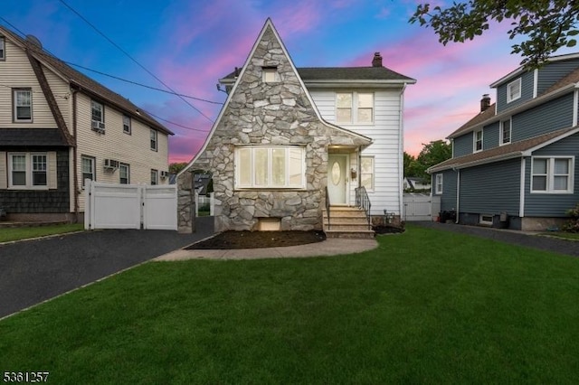 910 Caldwell Ave, Union Twp, NJ 07083 - view of front facade with a chimney, a gate, entry steps, a garage, and stone siding