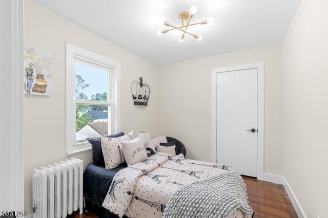 910 Caldwell Ave, Union Twp, NJ 07083 - bedroom featuring radiator, a chandelier, and dark wood-style flooring
