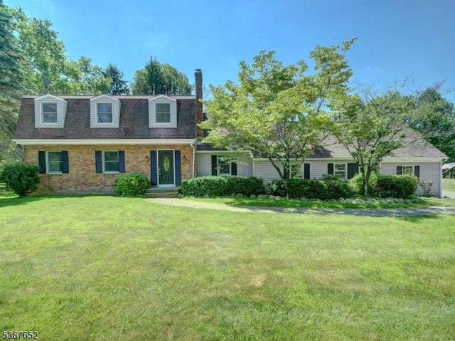 3 Cross Brook Dr, Tewksbury Twp, NJ 07830 - view of front of home with a chimney, a front yard, brick siding, and a shingled roof
