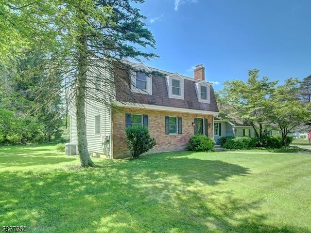 3 Cross Brook Dr, Tewksbury Twp, NJ 07830 - dutch colonial featuring a chimney, brick siding, a front lawn, and a gambrel roof