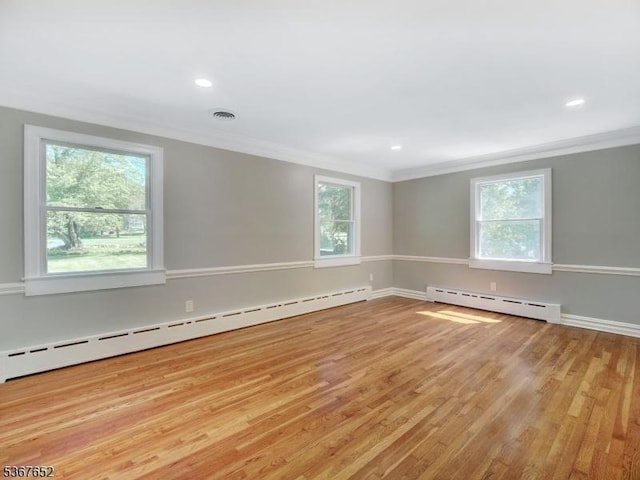 3 Cross Brook Dr, Tewksbury Twp, NJ 07830 - spare room featuring a baseboard heating unit, ornamental molding, plenty of natural light, light wood-type flooring, and recessed lighting