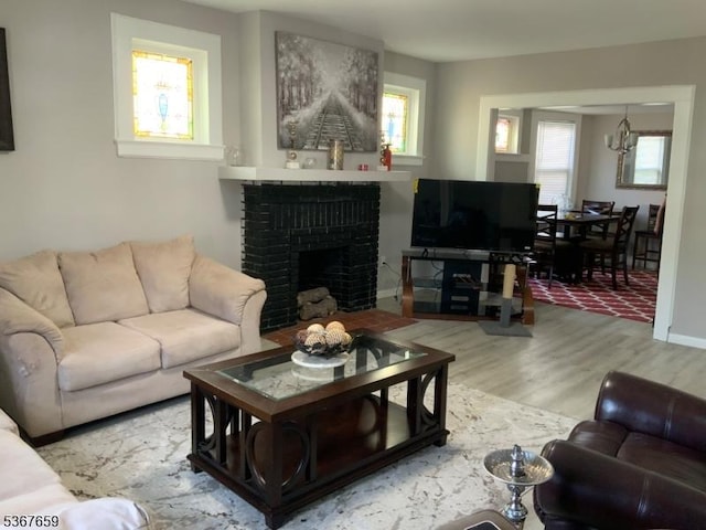 116 Mapes Ave Unit 3, Newark City, NJ 07112 - living area with wood finished floors and a fireplace