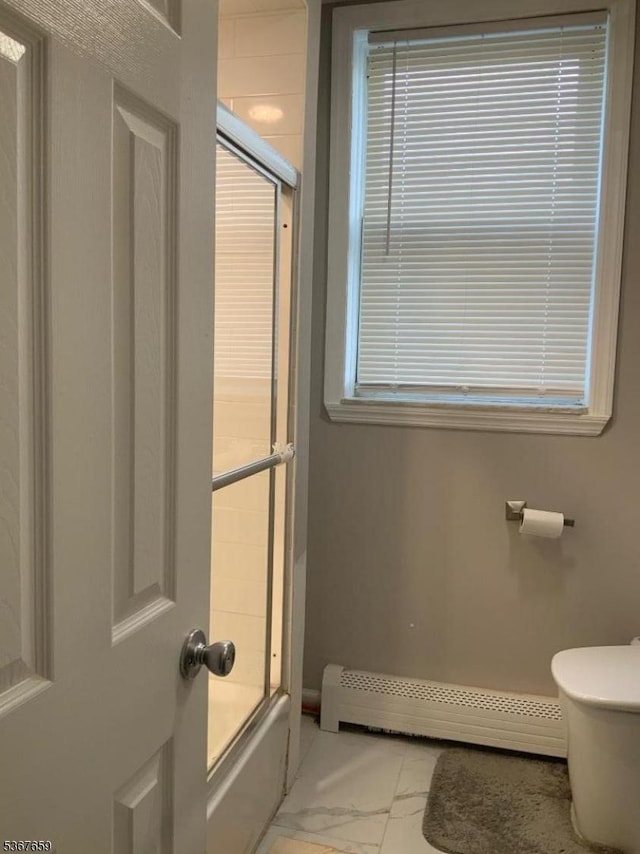 116 Mapes Ave Unit 3, Newark City, NJ 07112 - full bathroom featuring baseboard heating and bath / shower combo with glass door