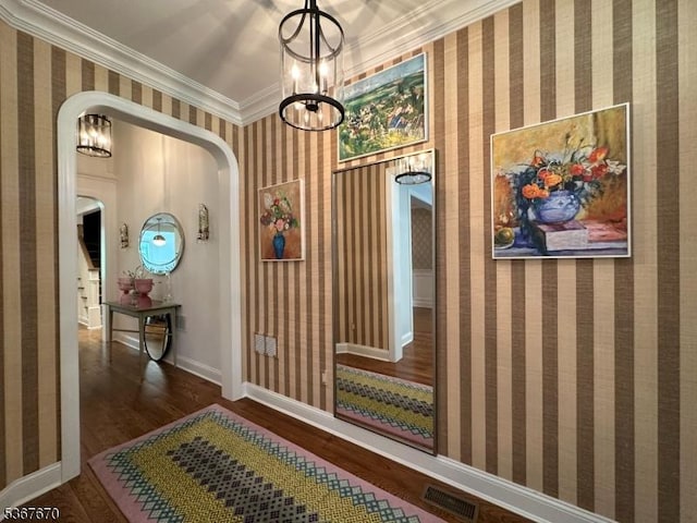 15 Poplar Ln, Chatham Twp, NJ 07928 - corridor with arched walkways, wood finished floors, a chandelier, and crown molding