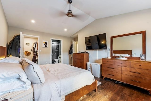410 Porter Way, Bridgewater Twp, NJ 08807 - bedroom with dark wood-style flooring, vaulted ceiling, a walk in closet, connected bathroom, and a ceiling fan