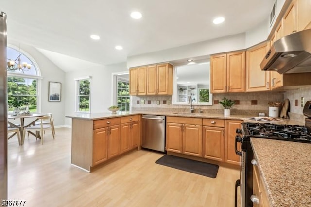 211 Woods End Dr, Bernards Twp, NJ 07920 - kitchen featuring appliances with stainless steel finishes, under cabinet range hood, light wood-type flooring, tasteful backsplash, and lofted ceiling