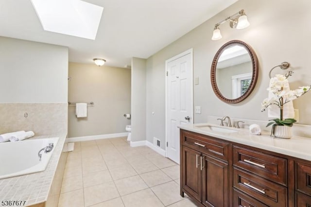 211 Woods End Dr, Bernards Twp, NJ 07920 - bathroom with a skylight, vanity, a garden tub, and tile patterned floors