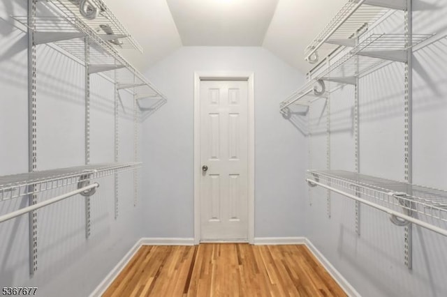211 Woods End Dr, Bernards Twp, NJ 07920 - walk in closet with wood finished floors and vaulted ceiling