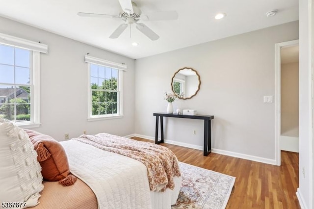 211 Woods End Dr, Bernards Twp, NJ 07920 - bedroom with multiple windows, wood finished floors, a ceiling fan, and recessed lighting