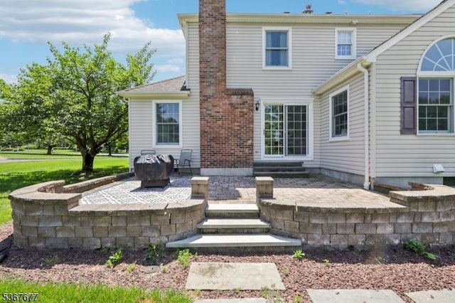 211 Woods End Dr, Bernards Twp, NJ 07920 - back of property featuring a patio and a chimney