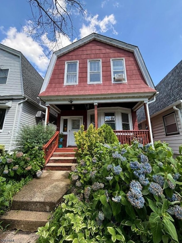 124 Bell St, Belleville Twp, NJ 07109 - colonial inspired home featuring a gambrel roof and covered porch