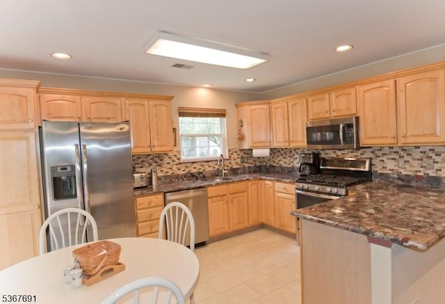 425 Diablo Ct, Mahwah Twp, NJ 07430 - kitchen with stainless steel appliances, light brown cabinets, backsplash, a peninsula, and recessed lighting