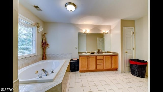 4 Lindsay Ln, Sparta Twp, NJ 07871 - bathroom featuring double vanity, a whirlpool tub, and tile patterned floors