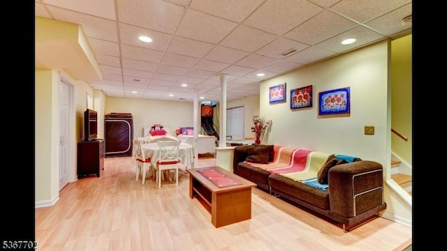 4 Lindsay Ln, Sparta Twp, NJ 07871 - living area featuring light wood finished floors, a paneled ceiling, stairway, and recessed lighting