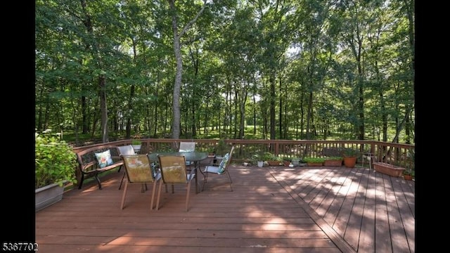 4 Lindsay Ln, Sparta Twp, NJ 07871 - wooden terrace with outdoor dining area