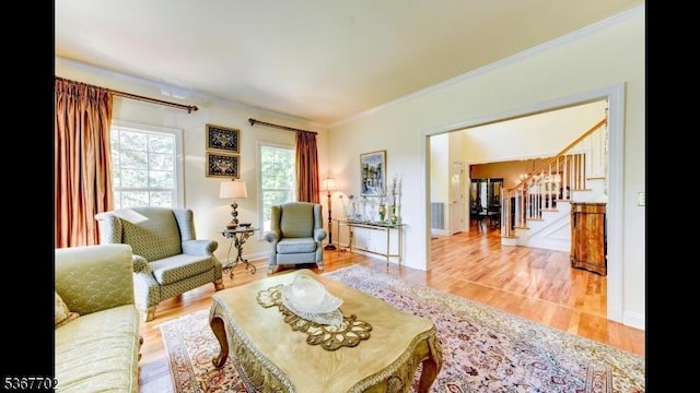 4 Lindsay Ln, Sparta Twp, NJ 07871 - living room featuring stairs, wood finished floors, and ornamental molding