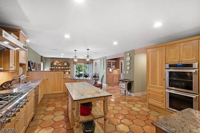 52 W Main St, Mendham Boro, NJ 07945 - kitchen with appliances with stainless steel finishes, a peninsula, recessed lighting, light stone counters, and light brown cabinetry