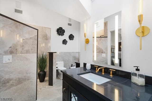 52 W Main St, Mendham Boro, NJ 07945 - bathroom featuring vanity, a shower, and tile walls