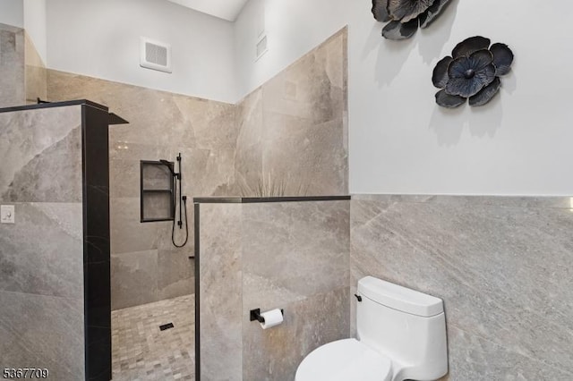52 W Main St, Mendham Boro, NJ 07945 - bathroom featuring walk in shower and tile walls