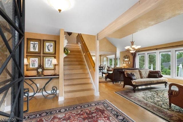 52 W Main St, Mendham Boro, NJ 07945 - living room featuring wood finished floors, stairs, and a chandelier