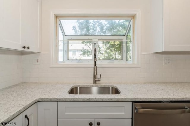255 Glastonbury Ln, Franklin Twp, NJ 08873 - kitchen featuring dishwasher, white cabinets, tasteful backsplash, and light stone countertops