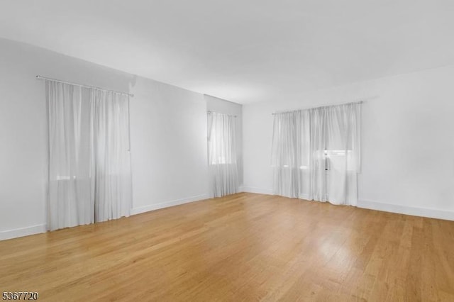 74 Elm Rd, Caldwell Boro Twp, NJ 07006 - spare room featuring wood finished floors and baseboards