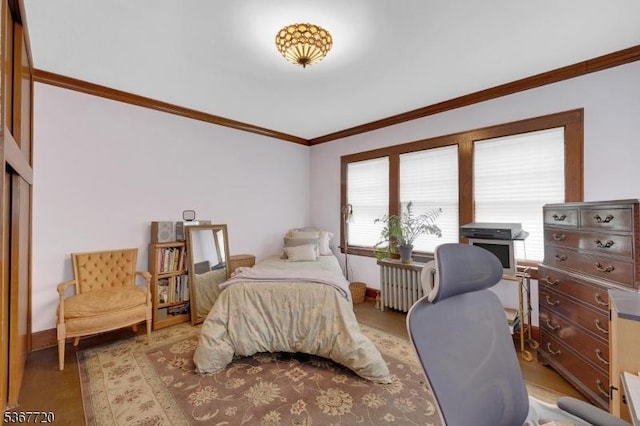 74 Elm Rd, Caldwell Boro Twp, NJ 07006 - bedroom featuring radiator, crown molding, multiple windows, and wood finished floors