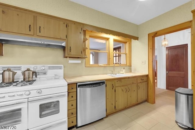 74 Elm Rd, Caldwell Boro Twp, NJ 07006 - kitchen featuring double oven range, dishwasher, under cabinet range hood, and light countertops