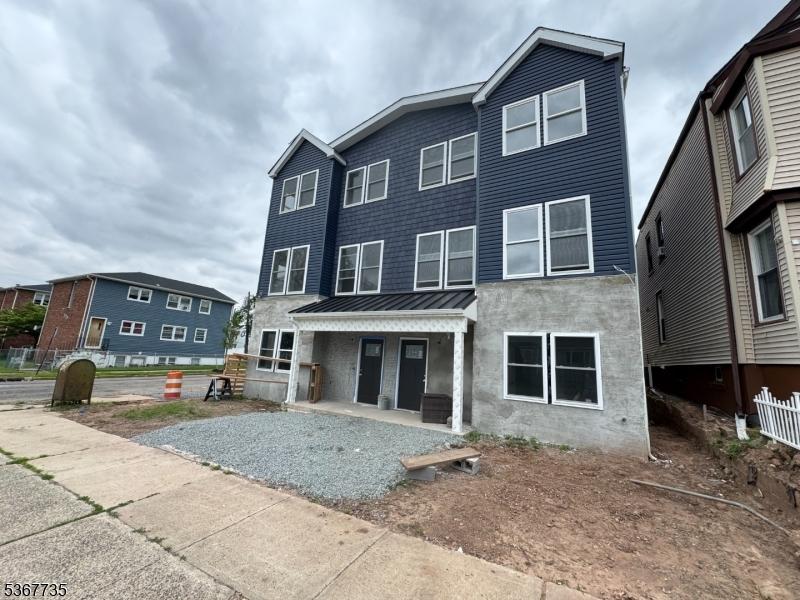 283 Rhode Island Ave Unit 2, East Orange City, NJ 07018 - multi unit property featuring a standing seam roof and a metal roof