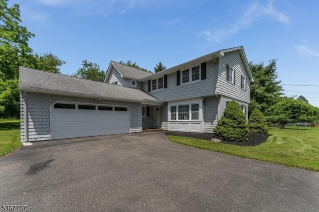 4 Orchid Pl, Clinton Twp, NJ 08833 - colonial inspired home featuring a garage, asphalt driveway, and a front yard
