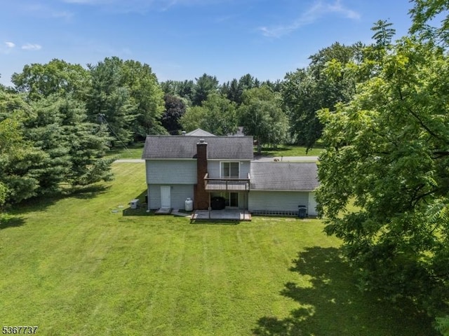 4 Orchid Pl, Clinton Twp, NJ 08833 - back of house with a yard and a wooden deck