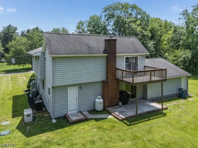 4 Orchid Pl, Clinton Twp, NJ 08833 - back of property with a chimney, a yard, a patio area, a deck, and roof with shingles