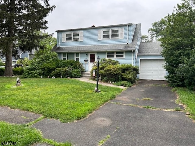 2081 Portland Ave, Scotch Plains Twp, NJ 07076 - traditional home featuring an attached garage, a front lawn, asphalt driveway, and a shingled roof