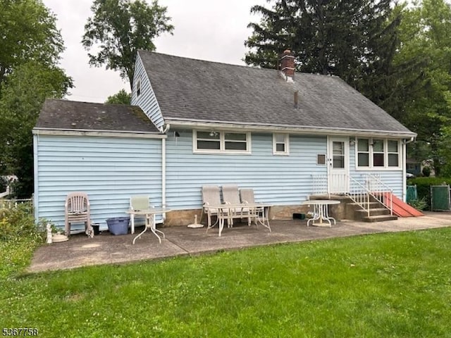 2081 Portland Ave, Scotch Plains Twp, NJ 07076 - back of property featuring a patio, a chimney, a lawn, entry steps, and roof with shingles