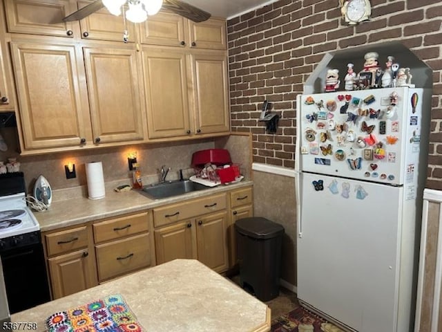 2081 Portland Ave, Scotch Plains Twp, NJ 07076 - kitchen with freestanding refrigerator, electric stove, light countertops, brick wall, and ceiling fan