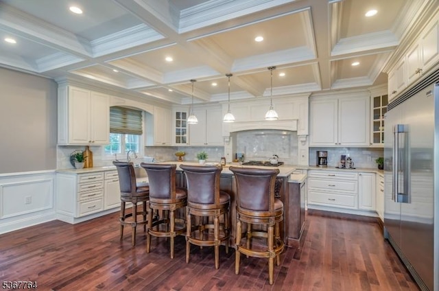 106 Woodbine Cir, New Providence Boro, NJ 07974 - kitchen with built in fridge, light countertops, dark wood-style floors, a center island, and beam ceiling