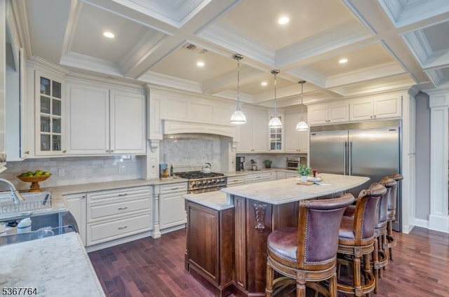 106 Woodbine Cir, New Providence Boro, NJ 07974 - kitchen featuring a kitchen island, dark wood-style floors, beam ceiling, glass insert cabinets, and high quality appliances
